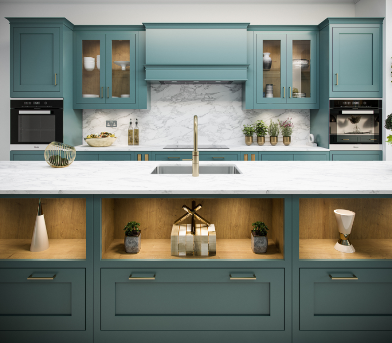 Novelle kitchen painted in a deep teal with marble worktops, brass tap and oak-lined open island shelving