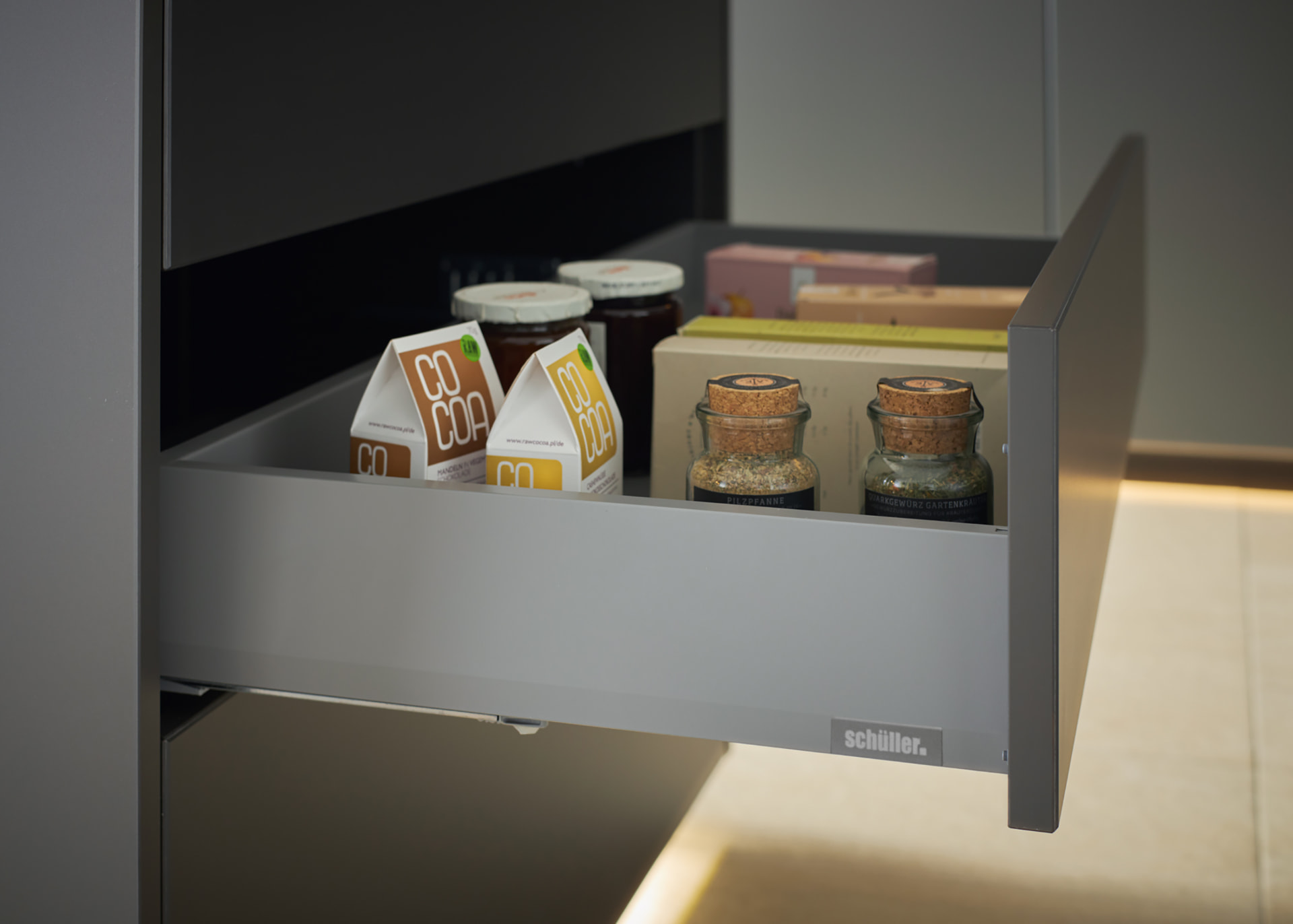Fitted kitchen drawer interior with cutlery and utensil organisation