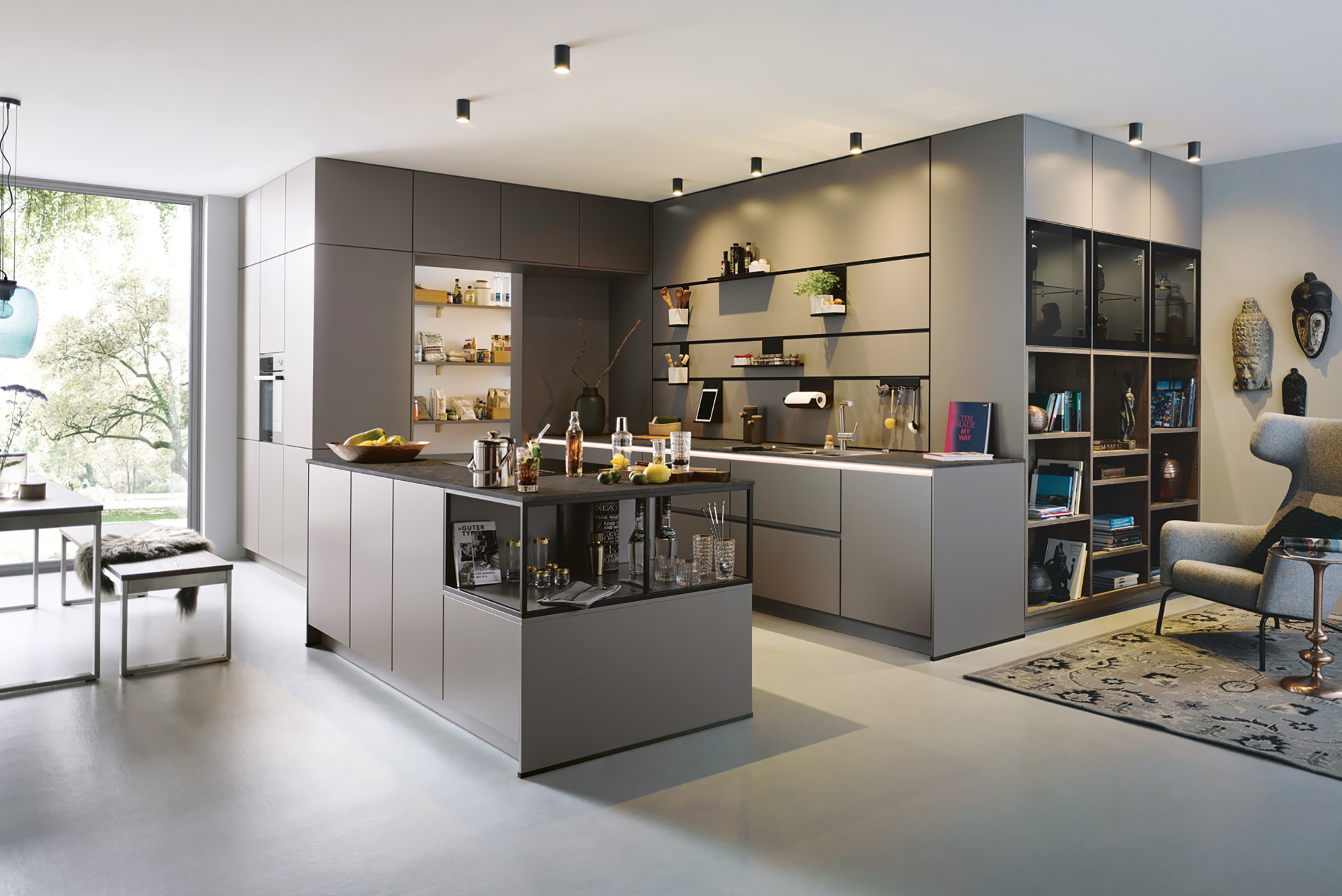 Matt graphite kitchen run with integrated appliances and open shelving