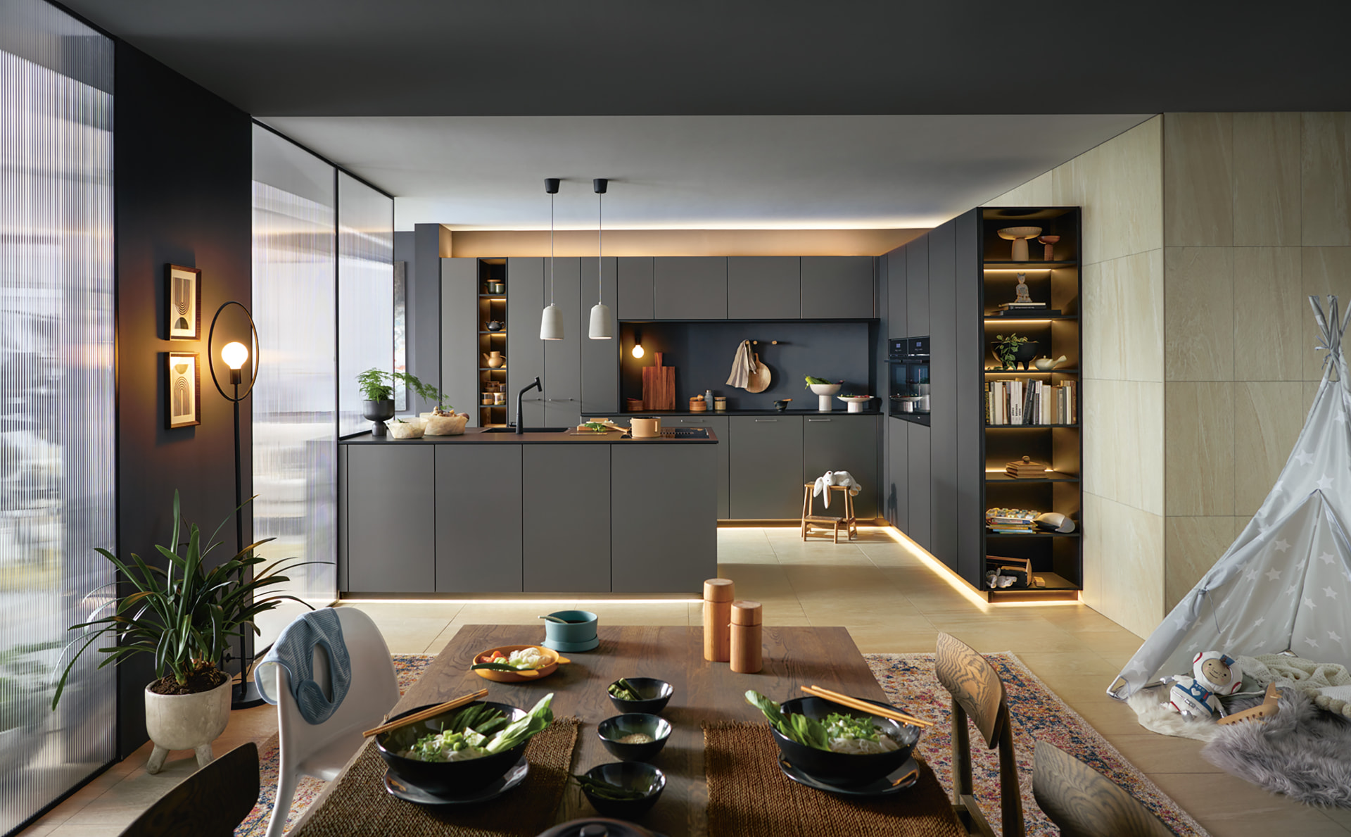 Large grey kitchen with a full-length island and floor-to-ceiling storage, designed in 3D by Studio Seven